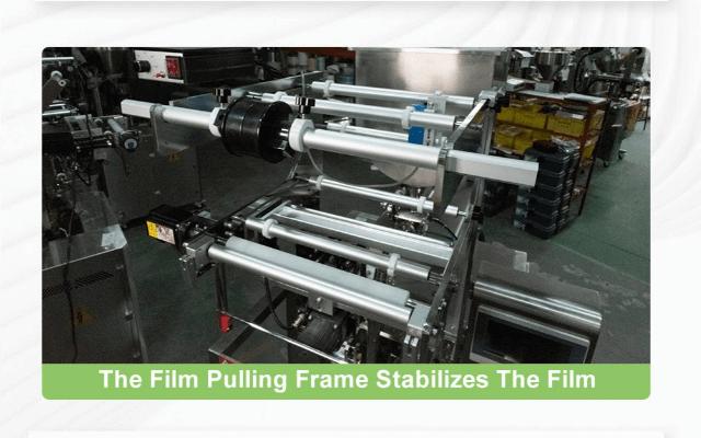 4The Film Pulling Frame Stabilizes The Film：The film pulling frame is used to fix and tighten the packaging film toensure that the film remains flat and stable during the packaging processavoiding wrinkles and devia.jpg